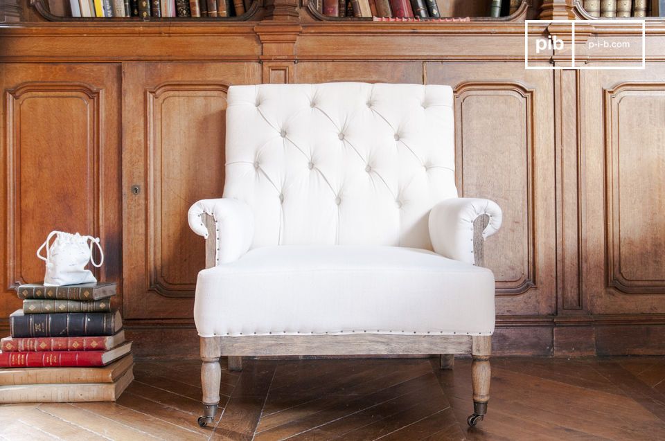 A white linen armchair with a huge cachet.