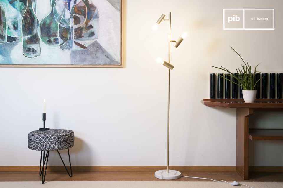 A gilded metal and retro marble floor lamp with a distinguished look.