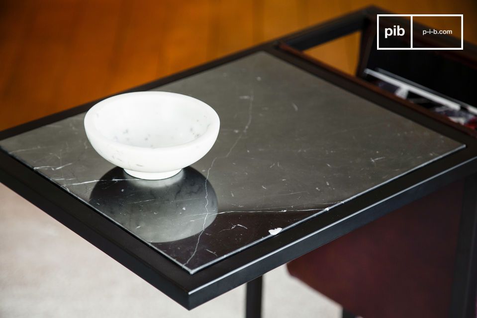 Beautiful black marble top with white veining.