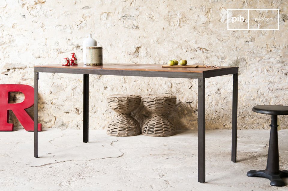 A table with a delicately industrial design.