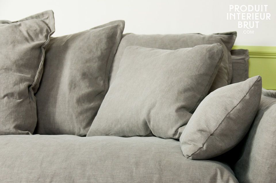 Three-seater sofa with nine soft cushions