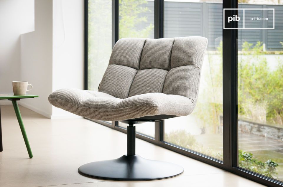 A comfortable armchair in the style of the 60s.