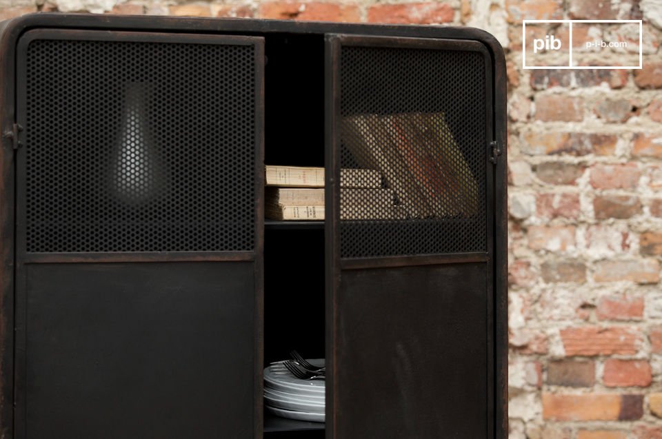 Double door in black openwork metal.