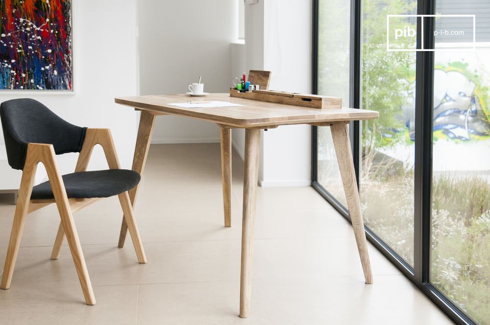 Very elegant desk in light wood.