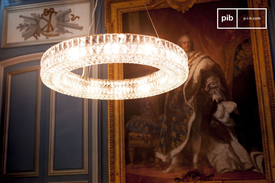 The bevelled glass of this chandelier elegantly diffuses light.
