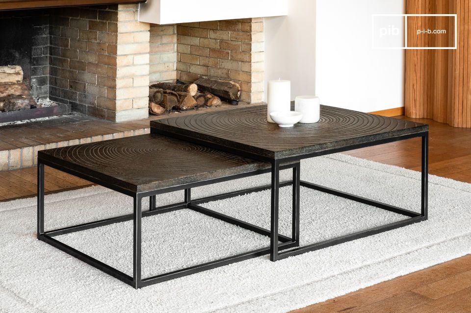Practical table in dark wood and black metal with a crazy charm.