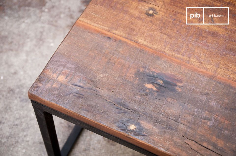 Recycled solid wood makes the table unique.