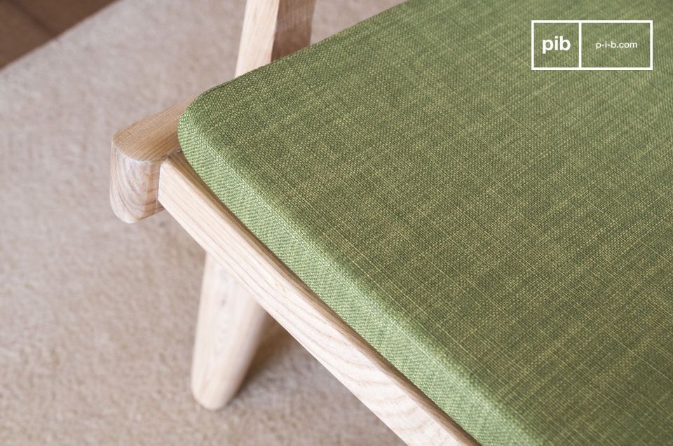 Beautiful olive green fabric combined with light wood for a beautiful harmony.
