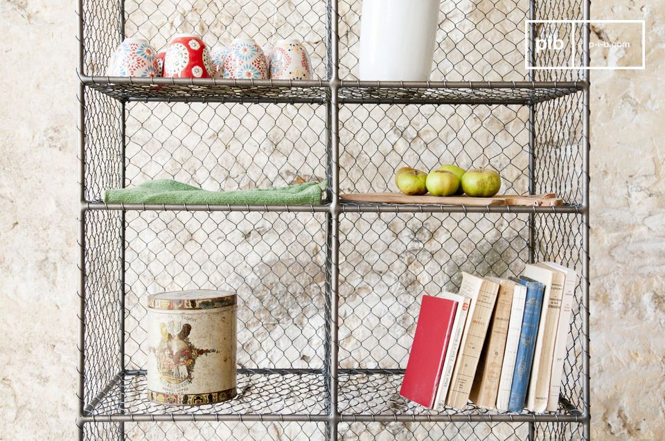 The shelf has many storage compartments.