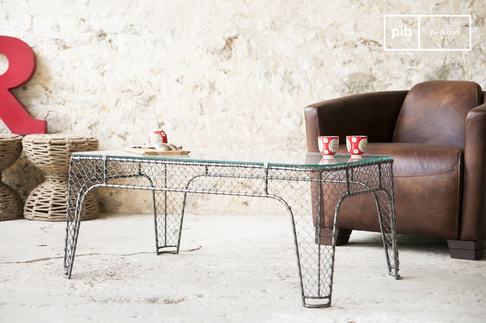 Industrial coffee table with wire mesh.