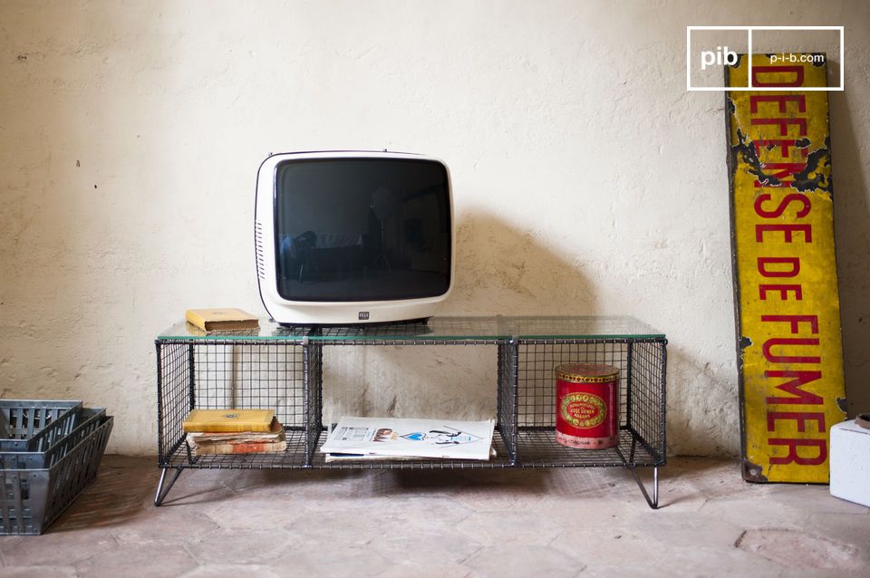 Elegant TV cabinet in metal and glass.