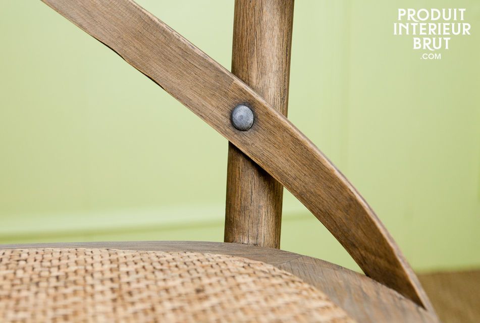 An armchair designed with oak that offers a definite retro style