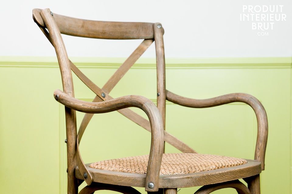 Opt for this authentic and natural armchair designed with oak