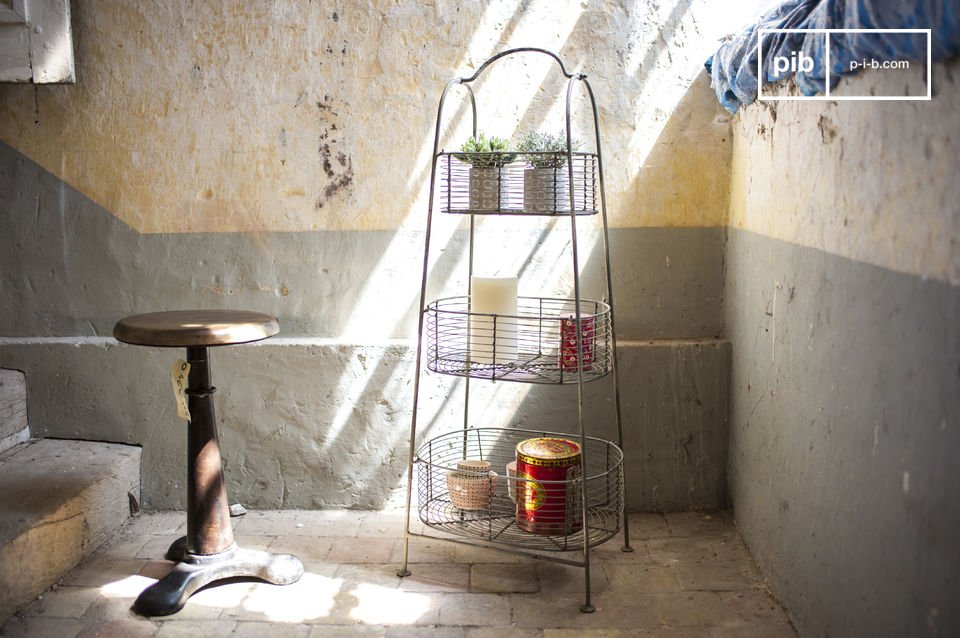 A pretty patinated carrier with three baskets.