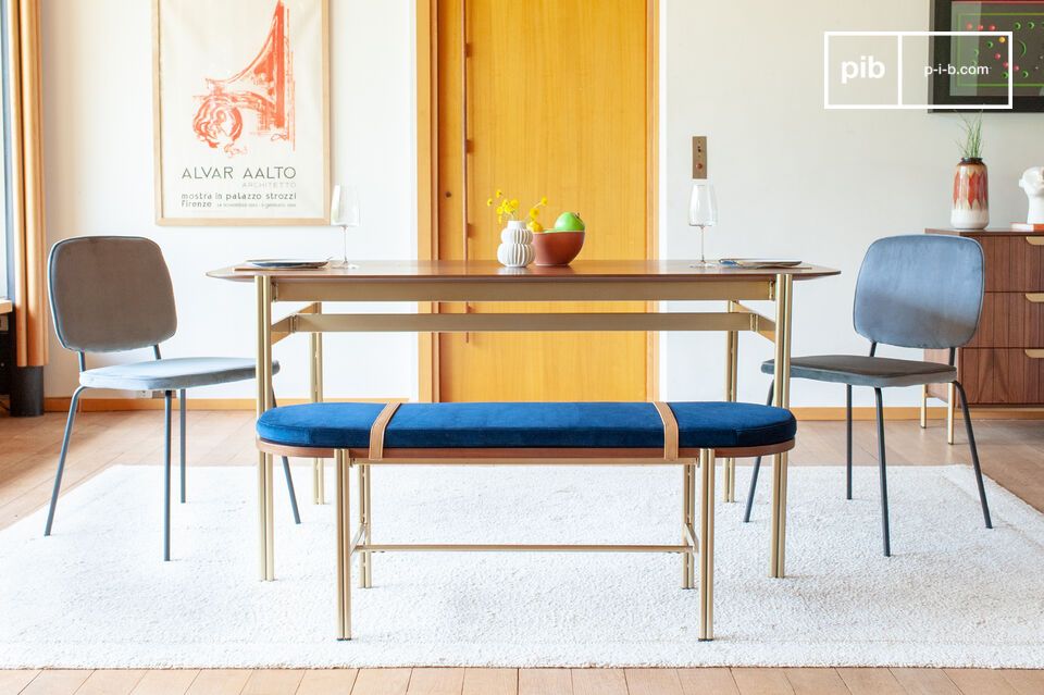 With its rich walnut colour and matt gold base, this table will add a charming touch to any space