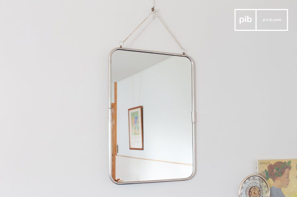 Brass mirror plated with a silver alloy.