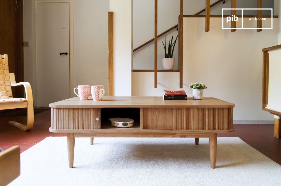 On both sides of the table is a storage space perfect to store some books and remote controls