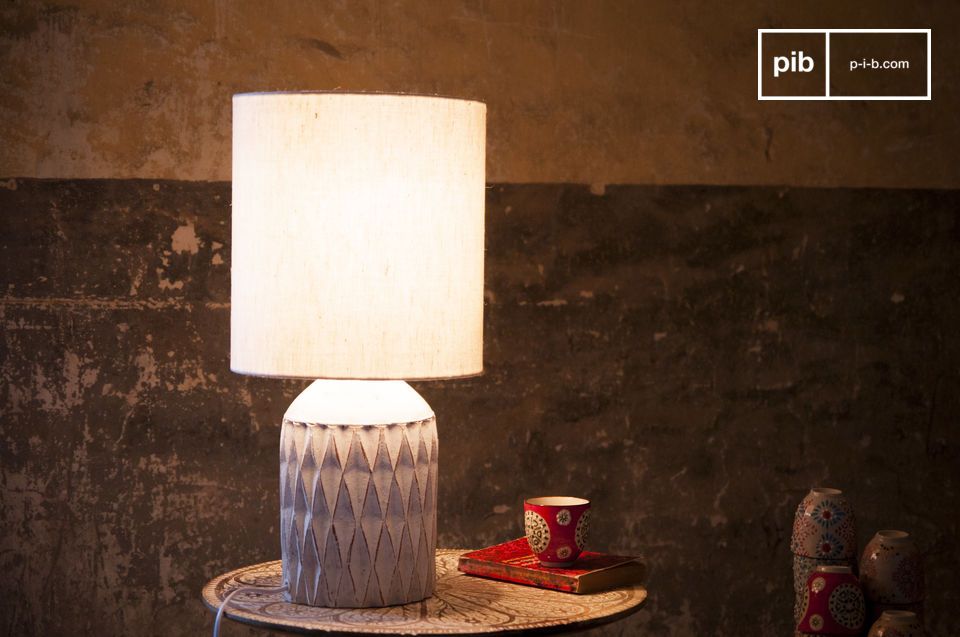 This example of shabby chic table lamps has a white patinated finish and is made out of terracotta