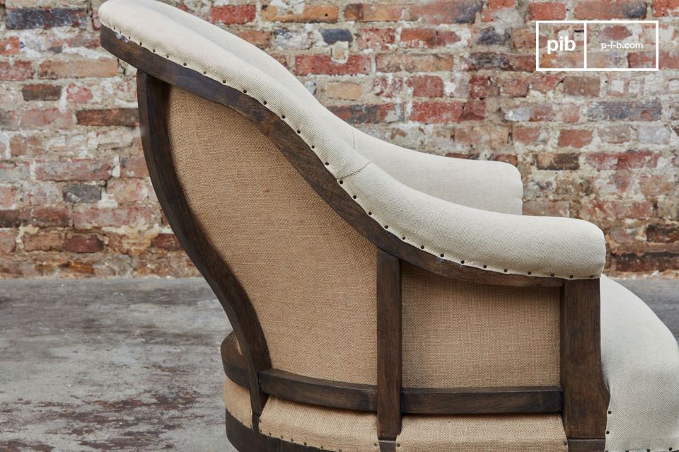 The Léonie round armchair is a pretty armchair in almond fabric that will bring a bohemian country