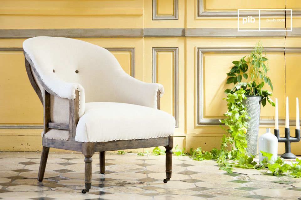 Beautiful white armchair in linen in country style.