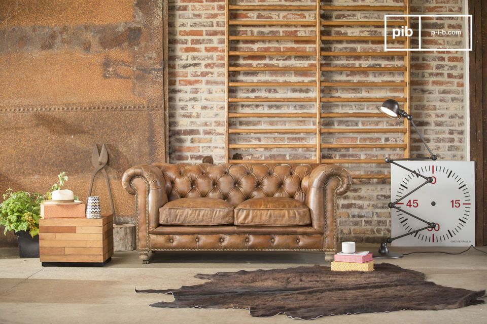 The industrial style of this sofa will add character to your living room.