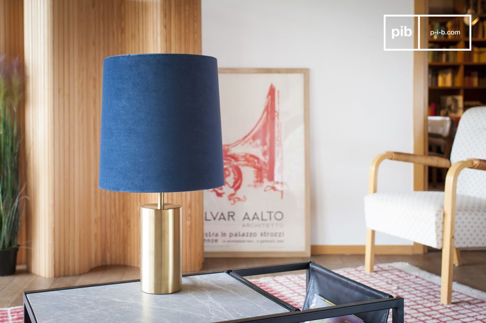 Pretty blue lamp with a golden foot inspired by the 60s.