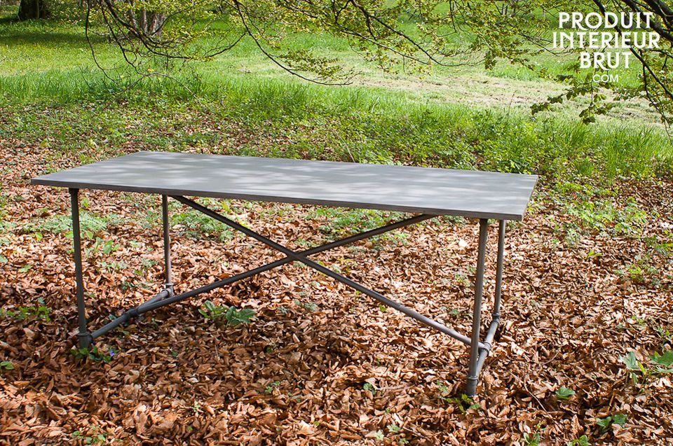 It has a metal tube leg assembly and a metal top, which is rare for a table of this size