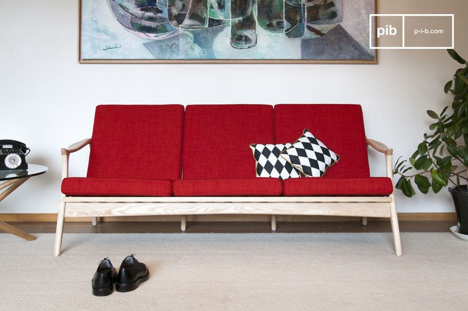 Beautiful bench in red fabric and light wood structure.