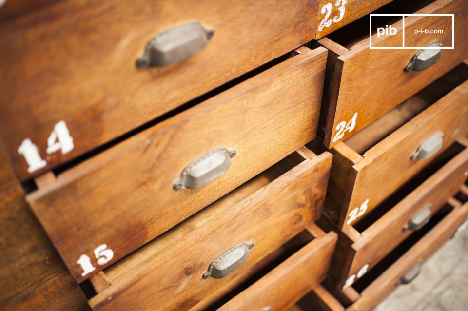 Each drawer is made of varnished wood and has a pretty half-moon handle.