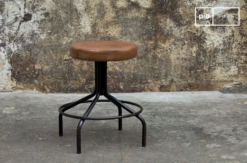 Small stool in brown leather and black metal.