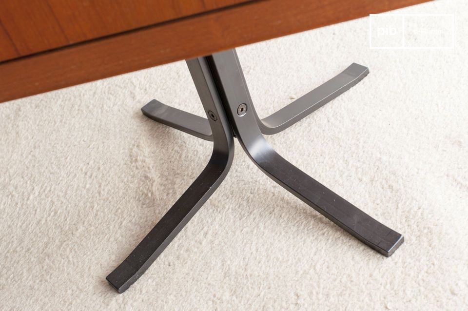 Elegant table base in contrasting black metal.