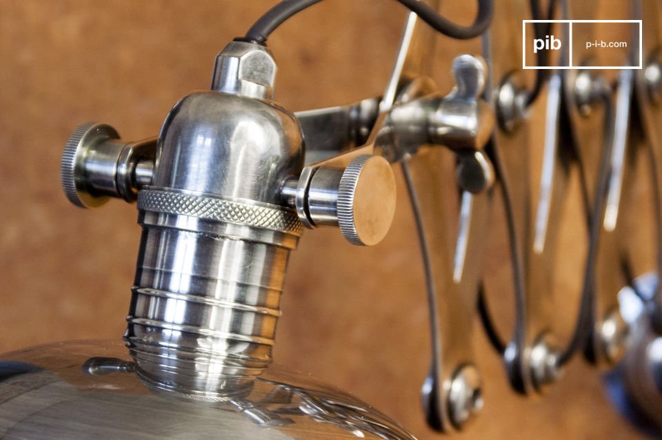 An original lighting fixture that is reminiscent of mid-century industrial design