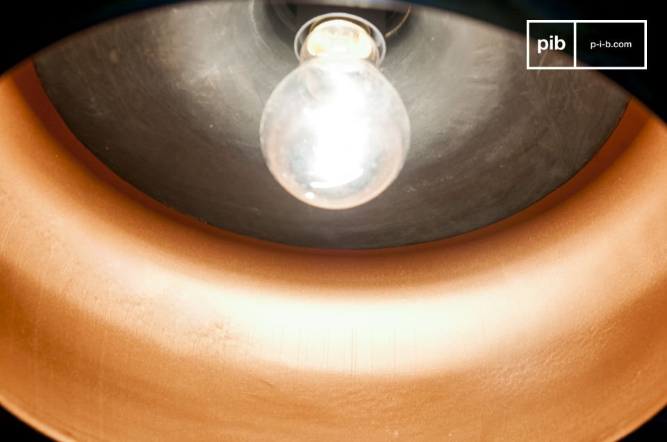 The interior is copper plated, which allows a warm light to be diffused.