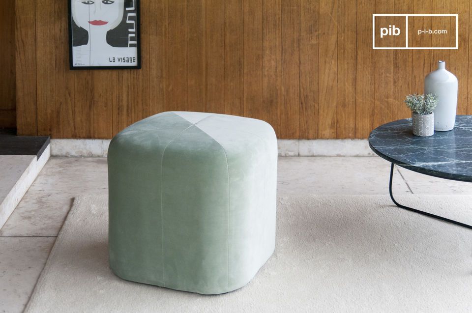 The pretty green velvet pouf changes colour with the brightness.