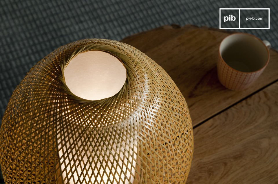 Enjoy the work of weaving bamboo that contribute to this trendy lamp\'s lightness