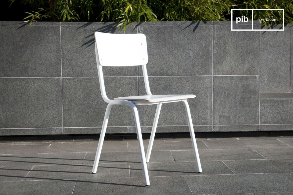 White chair with sleek lines.