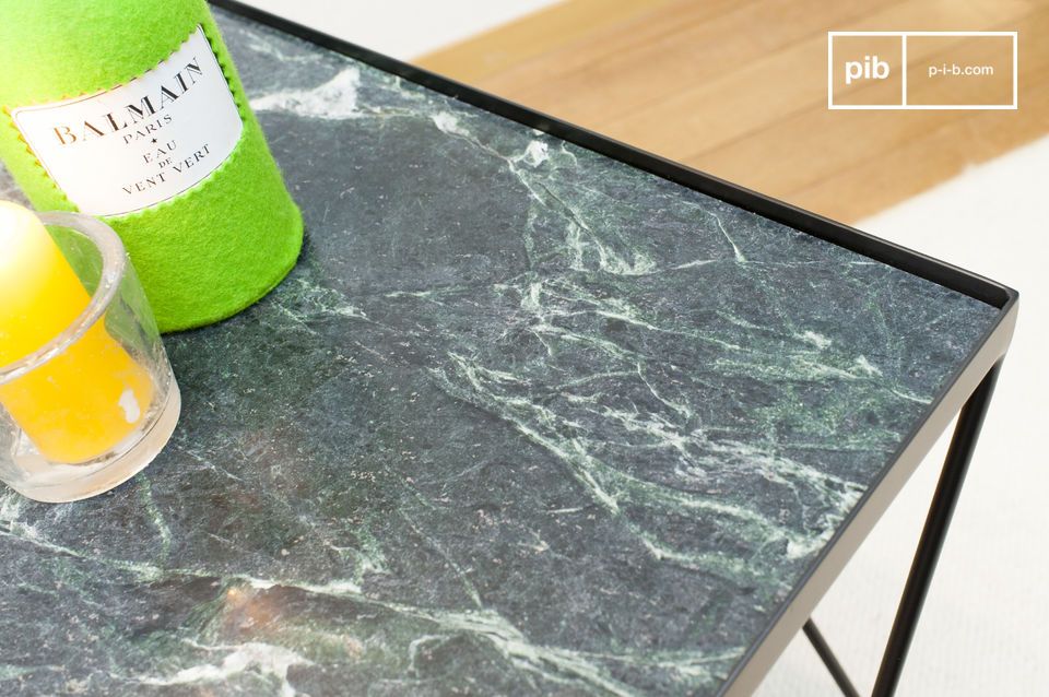 Deep green marble top with white veins.