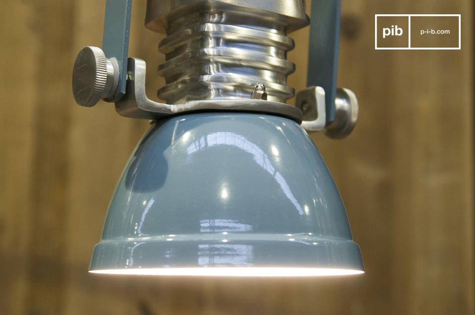 The lampshade is a pretty blue-grey varnished and shiny.