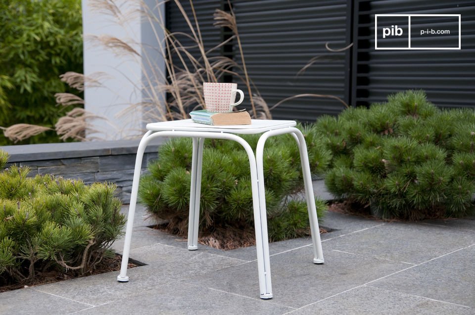 The metal stool has a beautiful matt white colour.