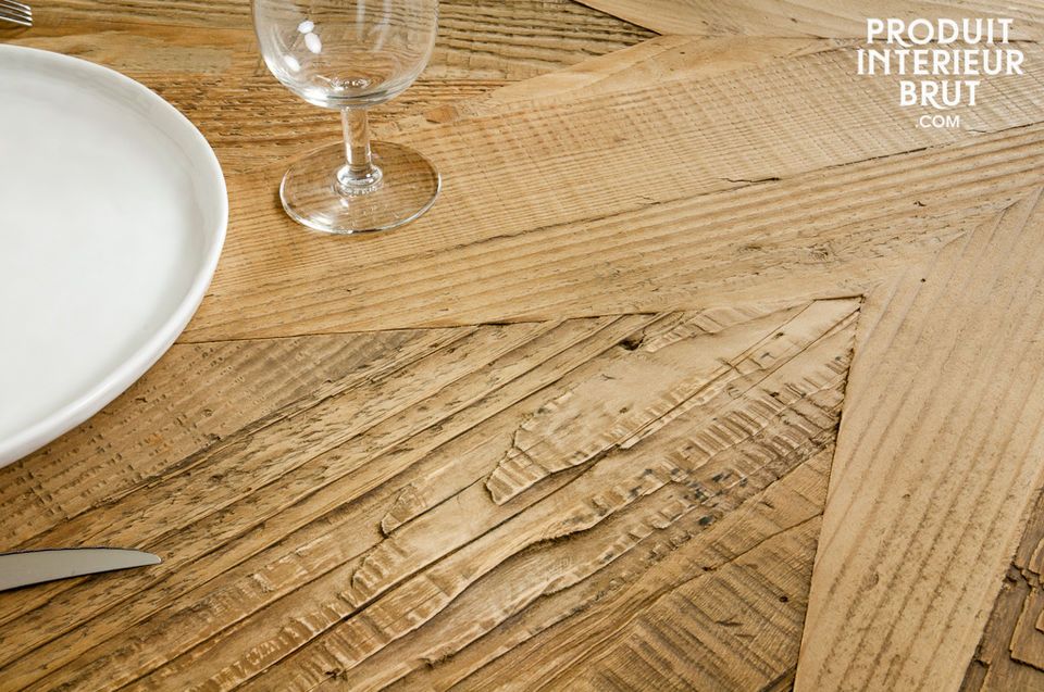 The Stella is a convivial and elegant dining table made entirely of aged solid pinewood