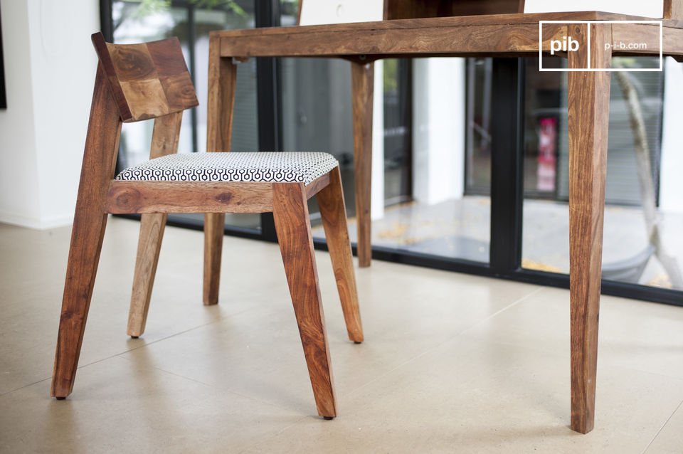 Original small chair in dark wood.