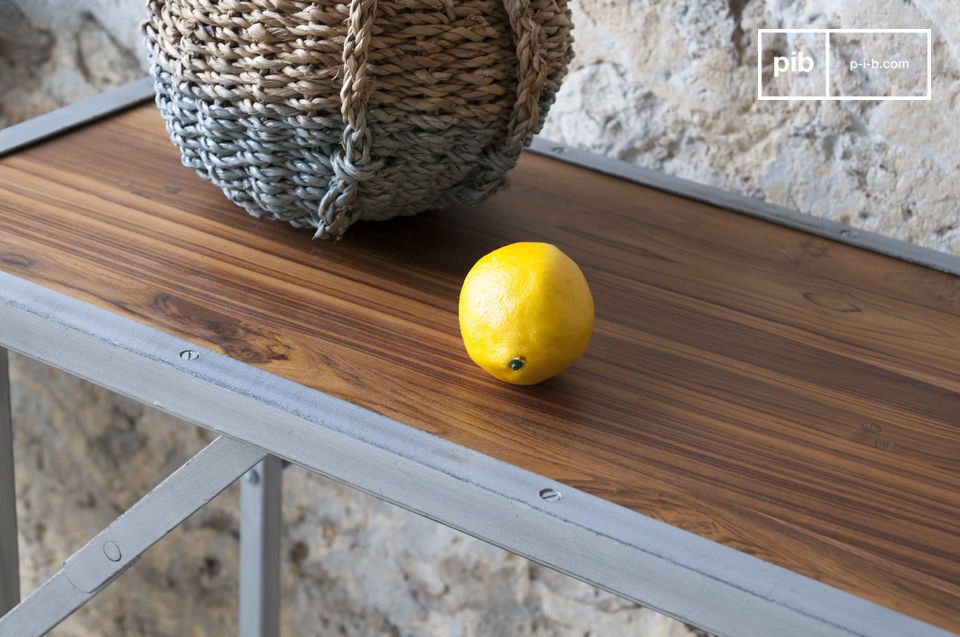 The pretty tray is made of varnished solid teak.