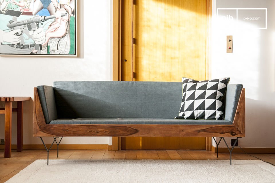 Elegant sofa with Scandinavian wooden lines.
