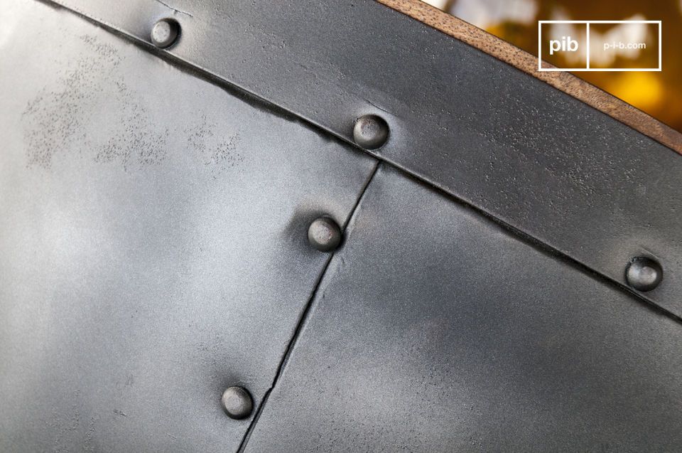 The table structure is decorated with pretty black rivets.