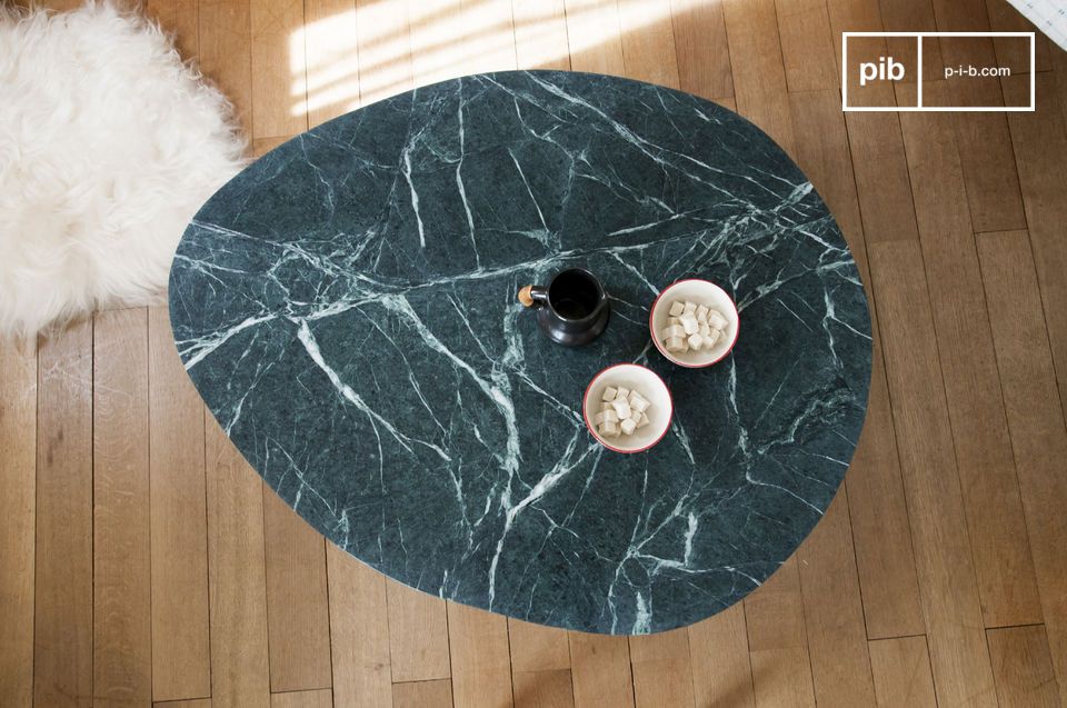 The marble is a magnificent deep green, veined with white.