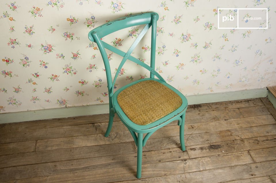 Choose this distressed beech wood chair for a touch of retro charm close to your table