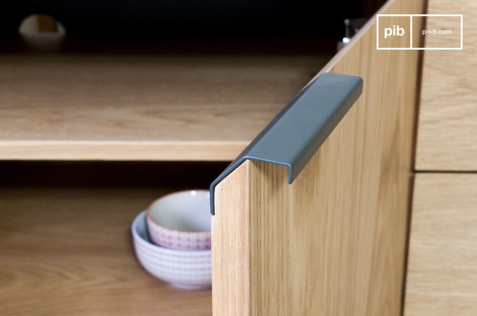 The handles offer an aesthetic contrast with the light oak.