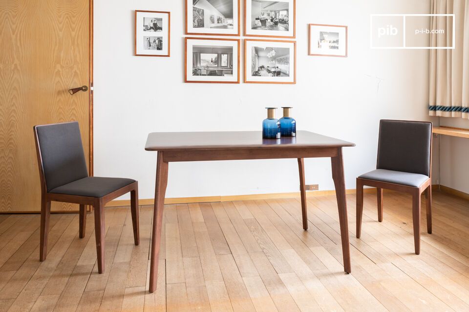 Scandinavian simplicity meets 60s charm in a compact, versatile design, enhanced by walnut-finish acacia wood.
