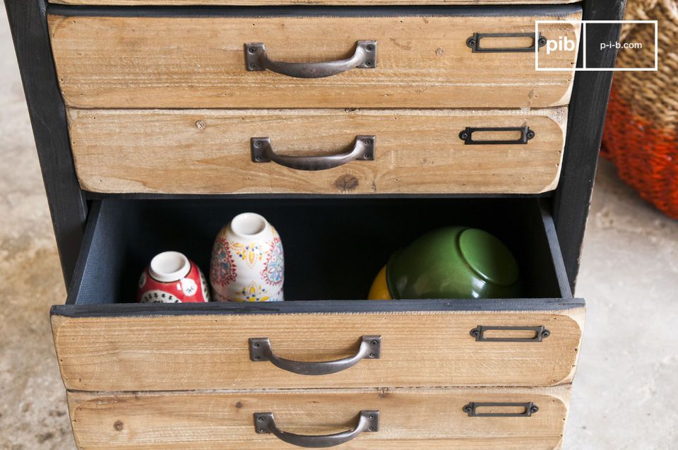 Several industrial-style drawers allow for easy storage.