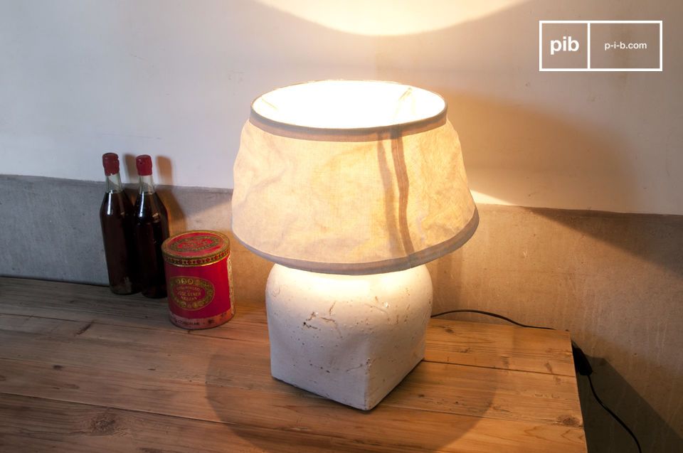 Beautiful terracotta lamp on wooden tray.